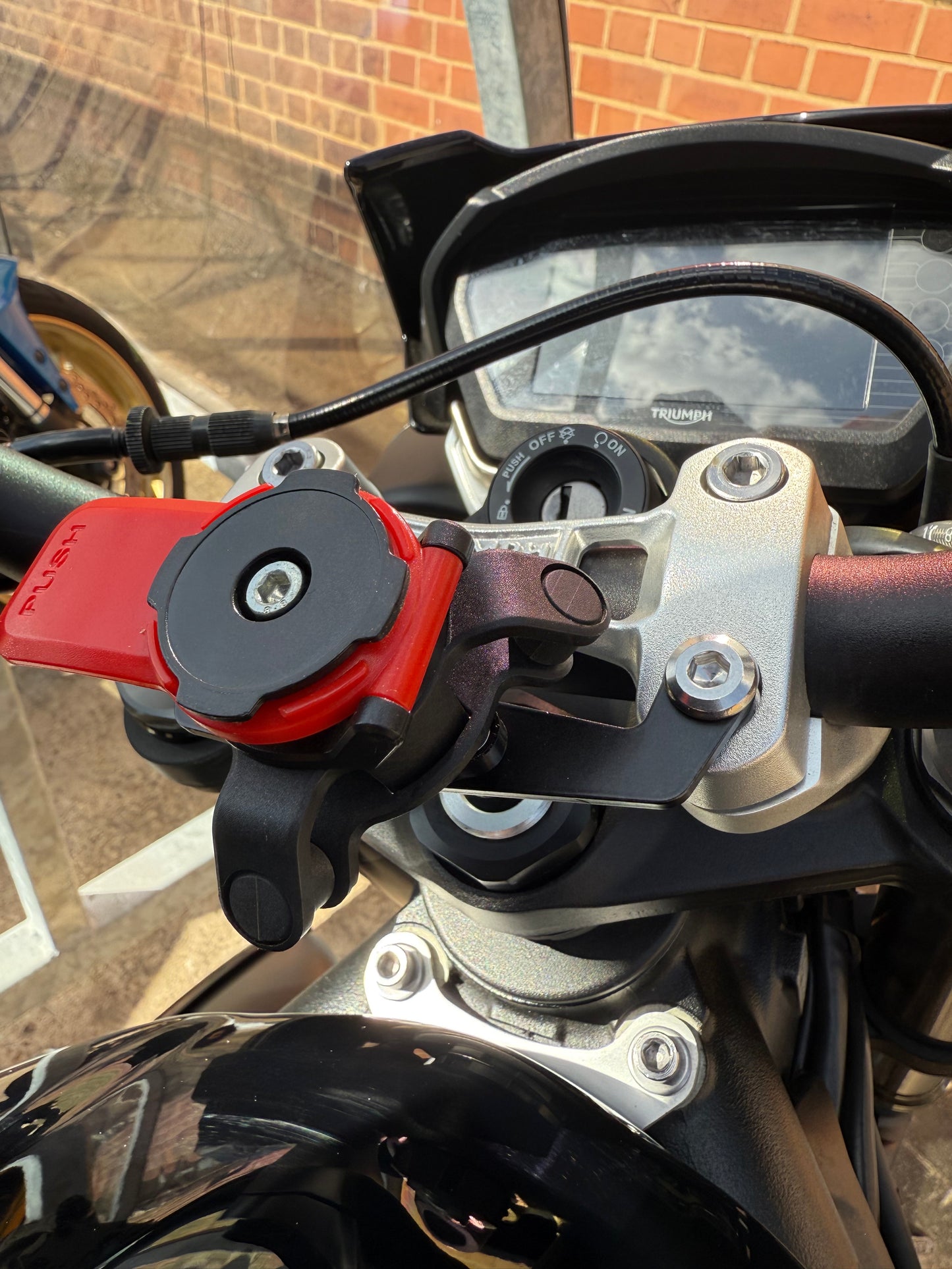 Triumph street triple 765R quadlock bracket