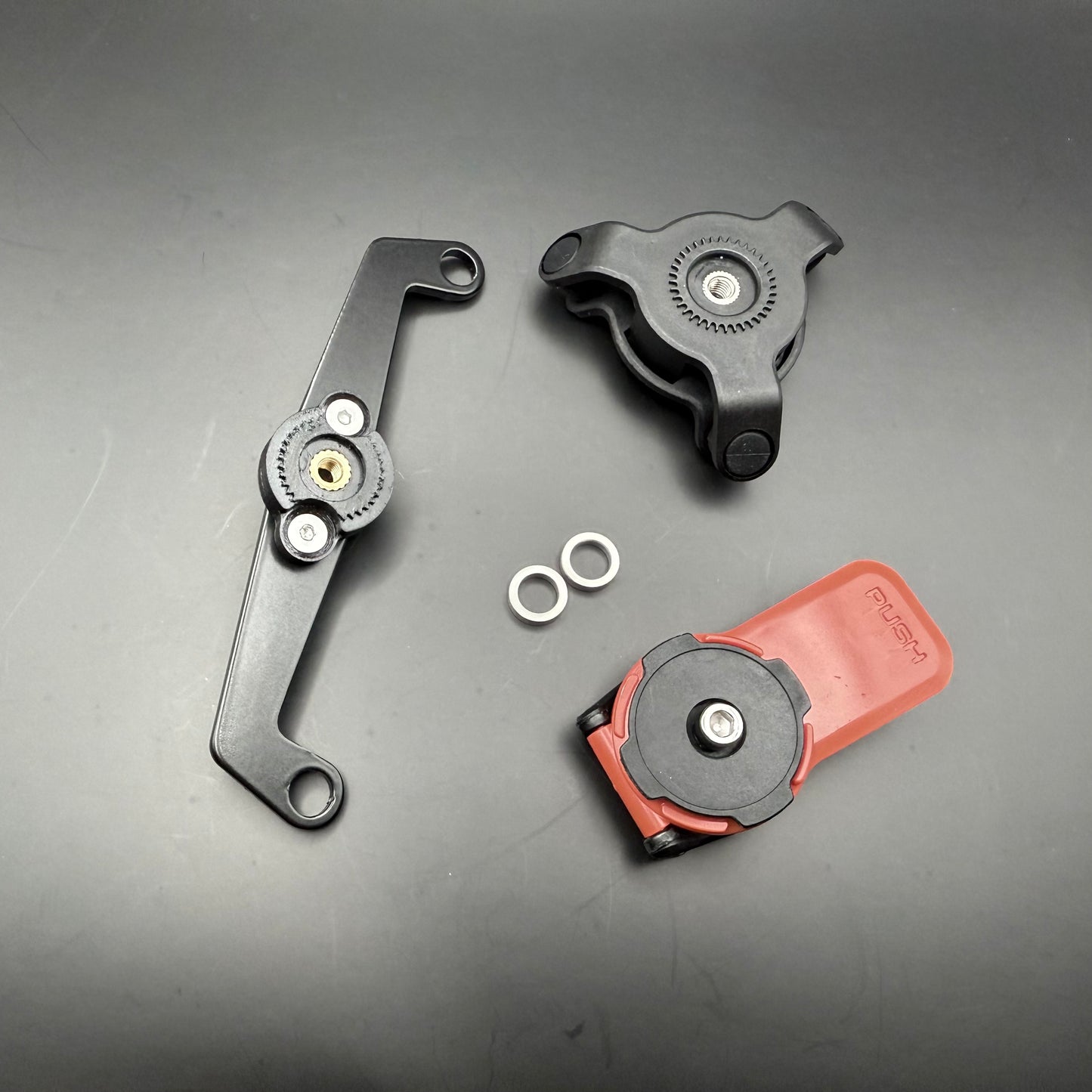 Triumph street twin quadlock bracket